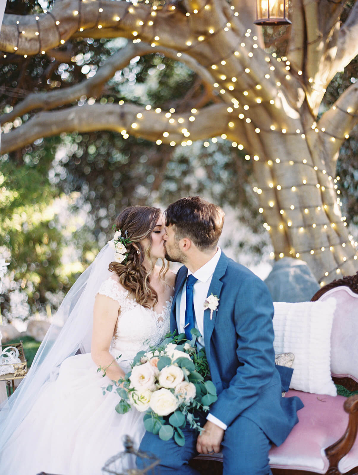 bride and groom kiss, wedding photography