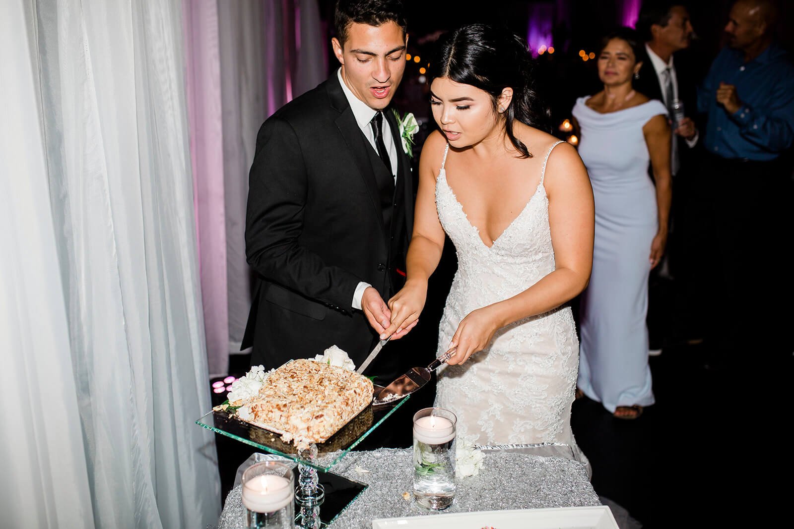 reception. bride and groom, cake