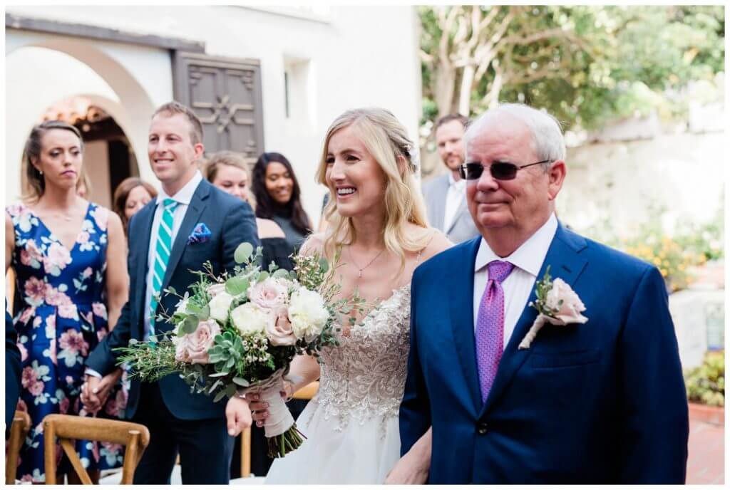 Darlington House Outdoor Wedding Ceremony in La Jolla with lush flowers 
