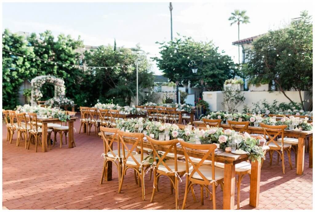 Darlington House Outdoor Wedding Ceremony in La Jolla with lush flowers 