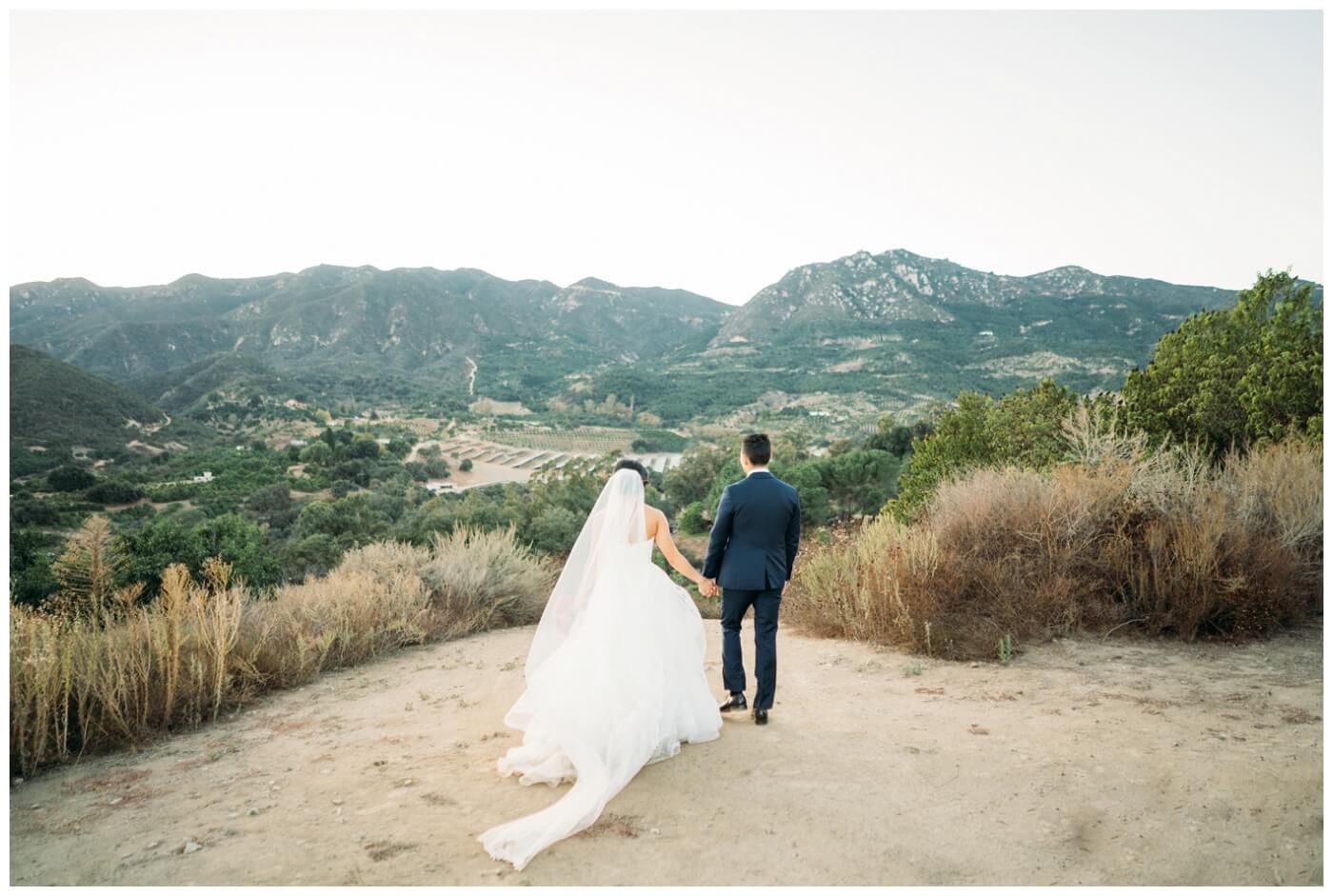 circle oak ranch wedding bride and groom epic scenic view of mountains